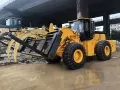Фронтальный погрузчик для блочного камня